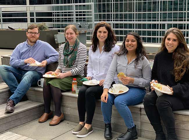 Recruitics employees enjoying a lunch break outside